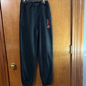 SHEIN Kids Black Joggers with Red Spade Detail